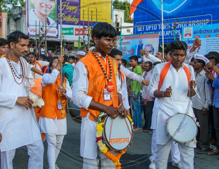 Indian  Folk Drum Players or Band Playing Drums on Streets During Lord Hanuman Procession