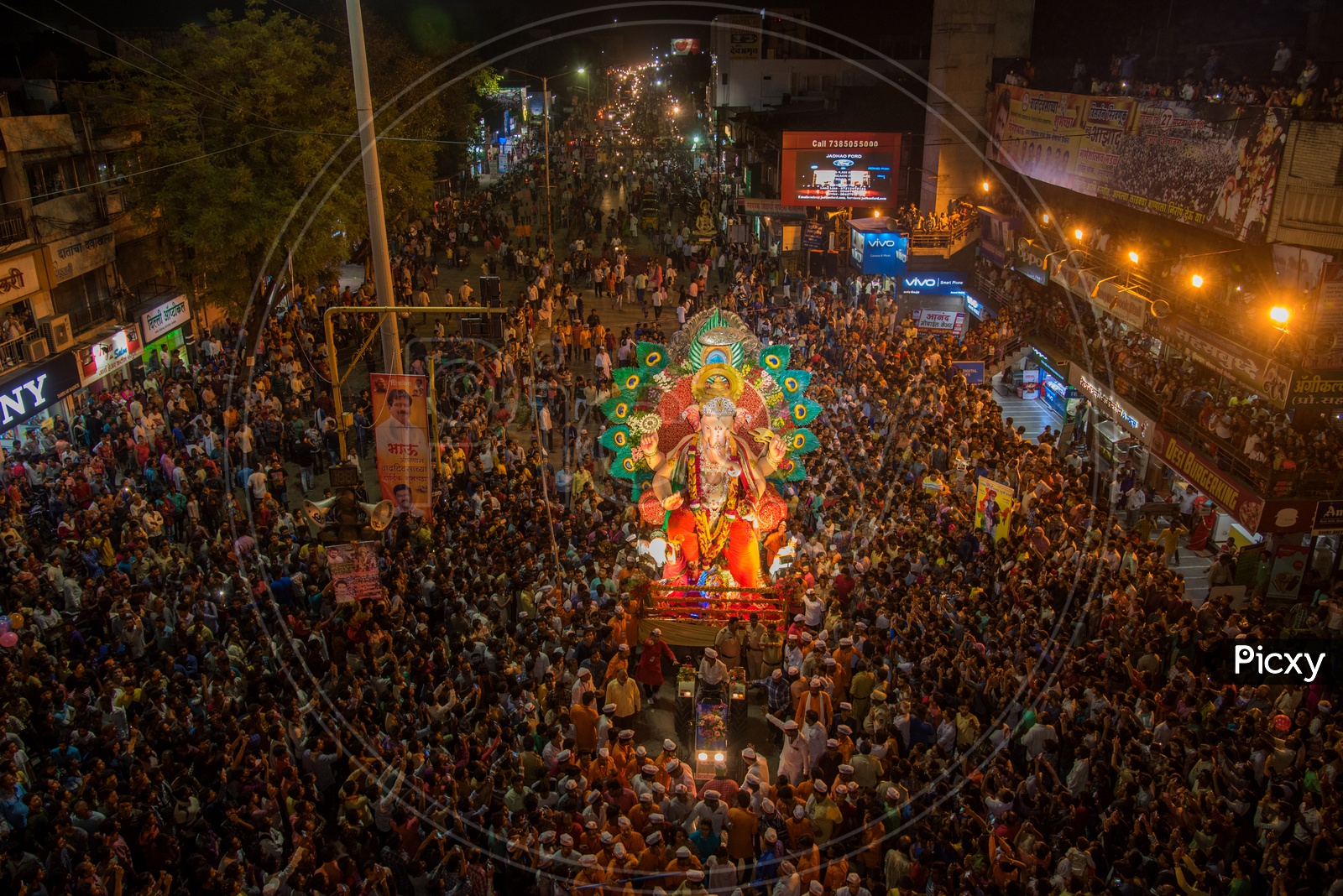 Image of Crowd Filled Roads With Lord Ganesh Idols In Procession During ...