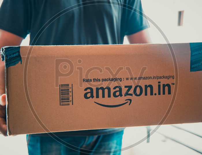 Amazon Delivery Boy delivering Parcel