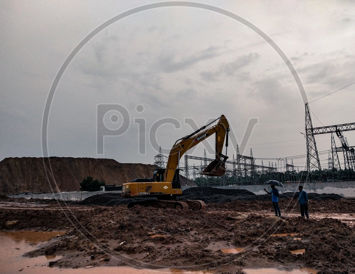 People working on the grounds of kaleshwaram project, digging routes to divert the water flow.