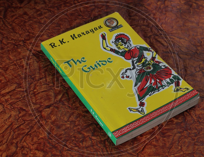 English novel on floor. RK Narayan THE GUIDE novel