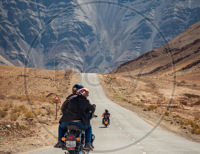 Passengers travelling on bullet towards Magnetic Hill Leh Ladakh on NH1