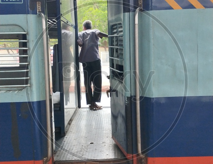 A passenger thinking to cross the railway track