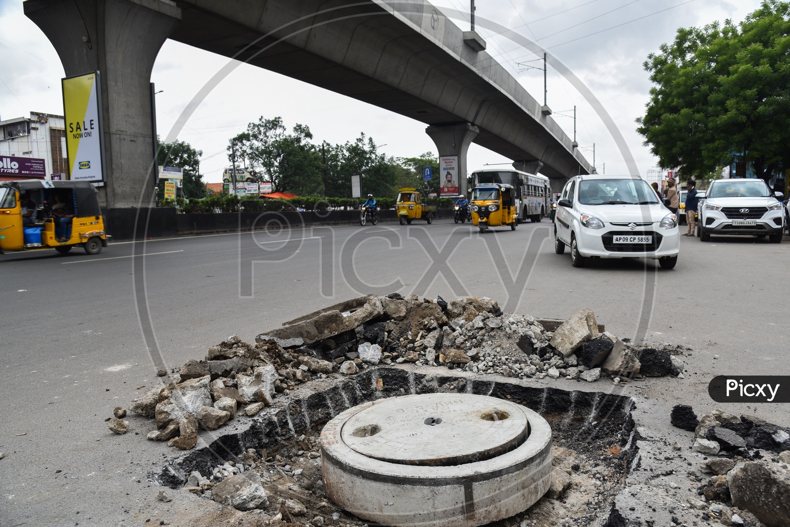 Potholes Made On  City Roads For The Renovation Of Drainage  Pothole Discs