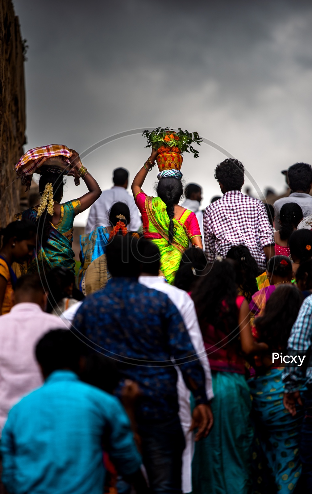 A Woman   Carrying Bonam or Bonalu On Her Head At Golconda