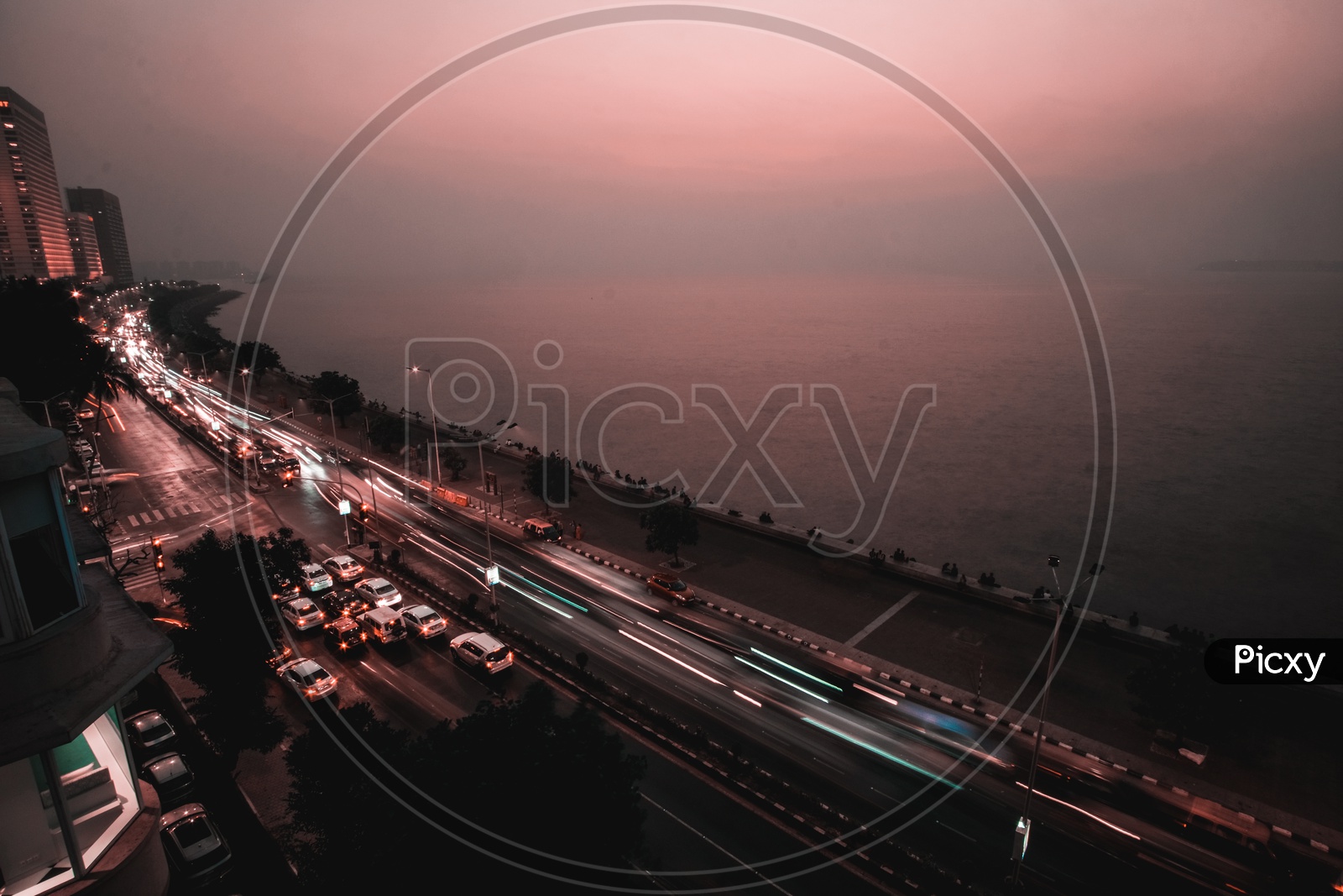 Aerial View Of  Fast Moving  Vehicles on Marine Drive Road in  Mumbai