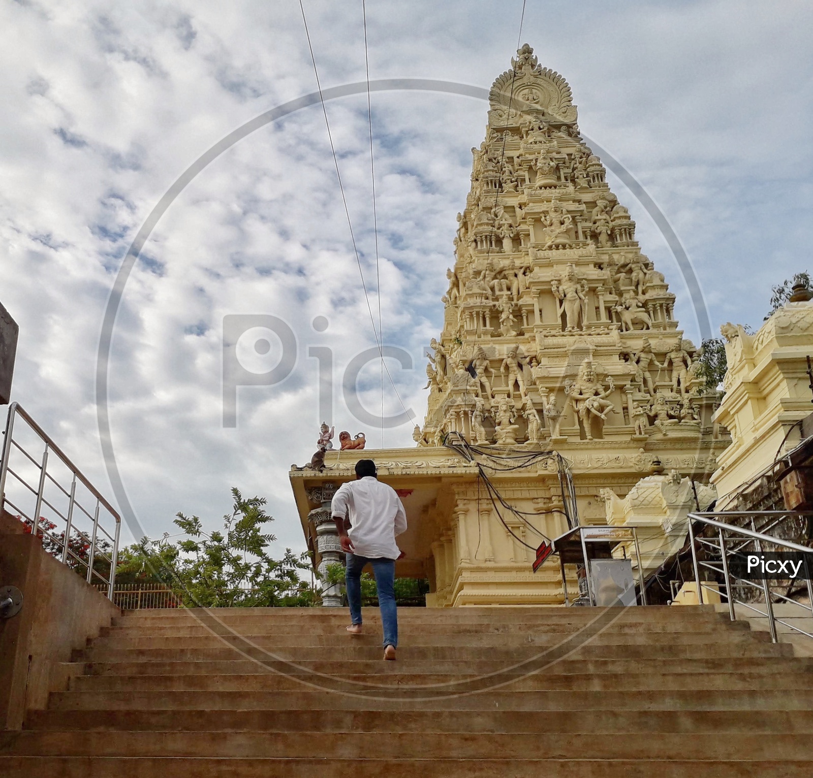 Climbing the steps to reach the temple