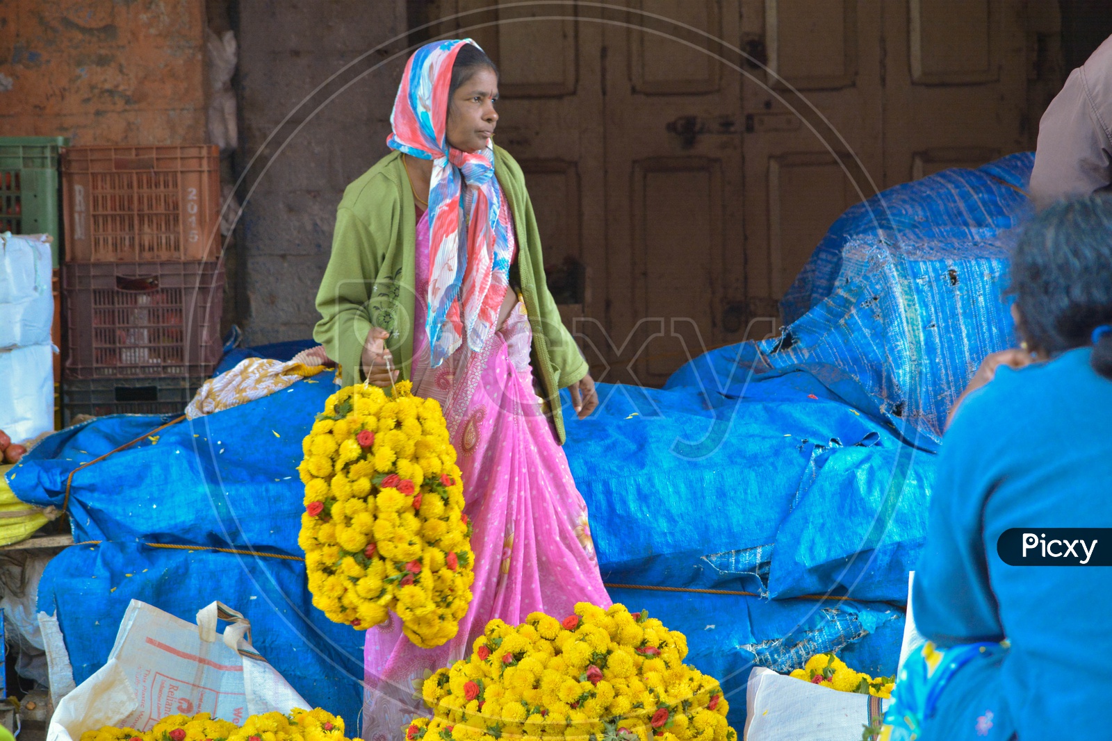 Woman selling flower in market