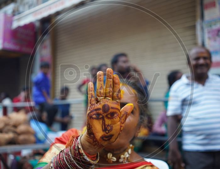Indian Woman Painted Goddess Durga On Palm