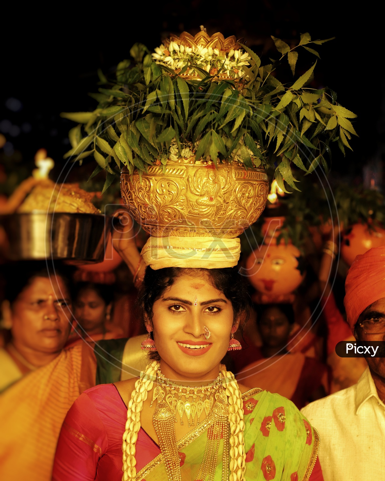 Telangana Bonalu Festival With Jogini Carrying Bonam On Head