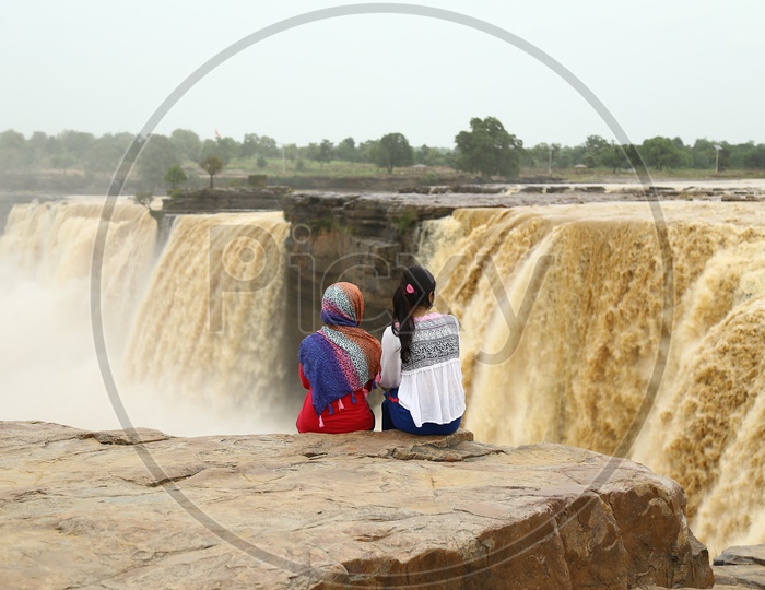 Indian  Young Girls Enjoying  At a Waterfalls