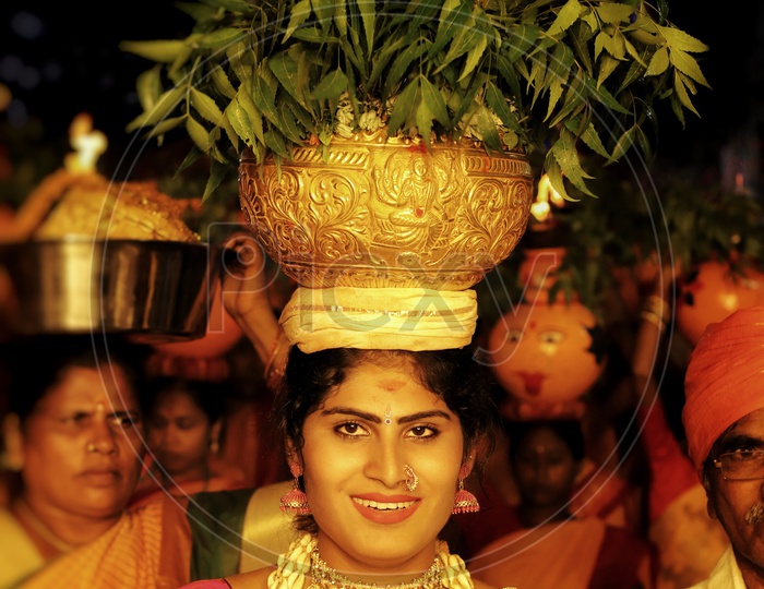 Telangana Bonalu Festival With Jogini Carrying Bonam On Head