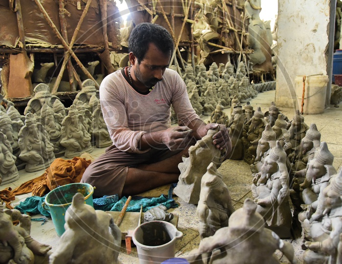 Making  Ganesh idols