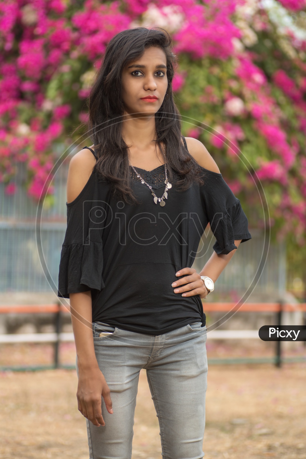 Young indian woman posing sitting on the floor Stock Photo by ©Radnatt  10390230