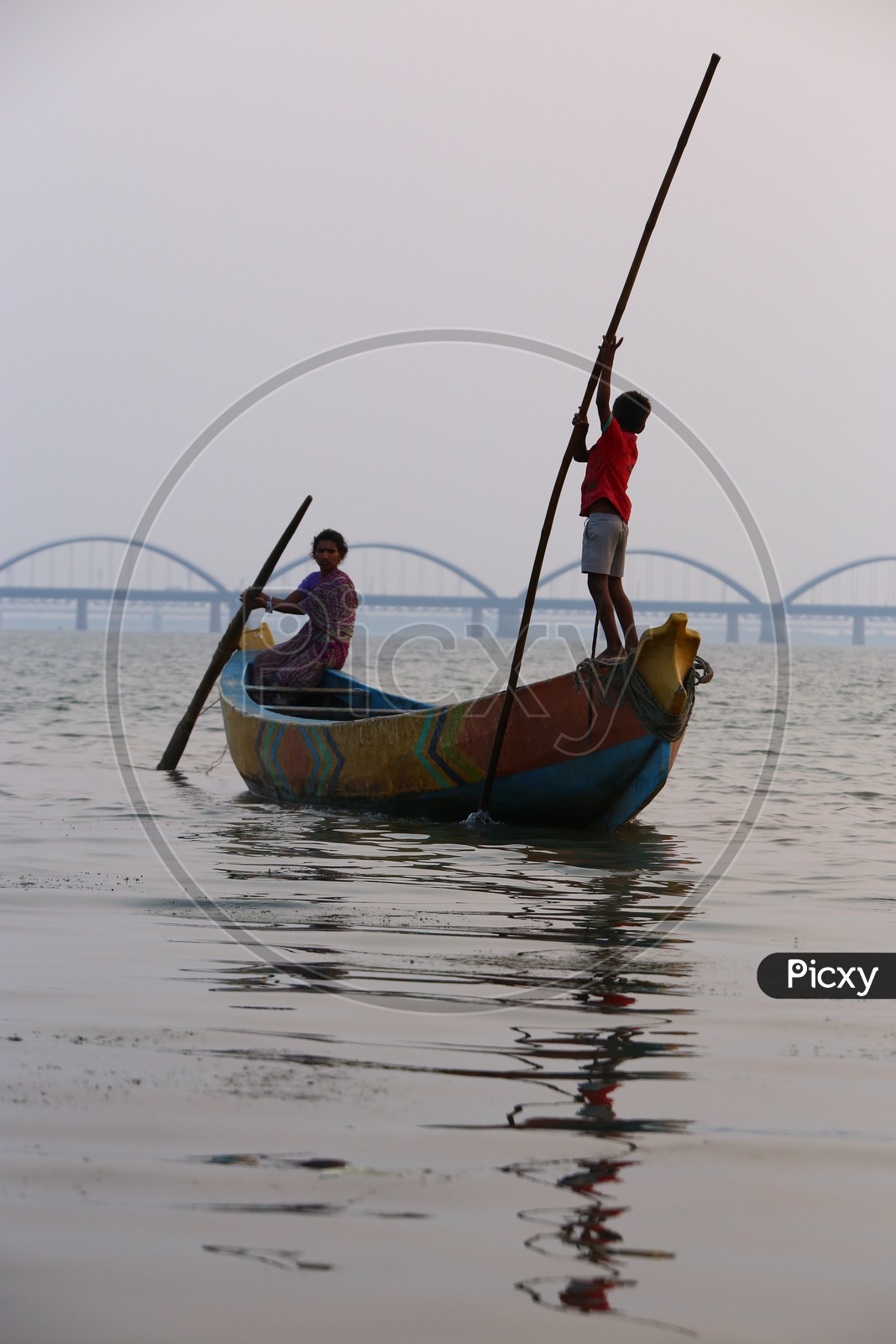 Fishing Boats On River Godavari With Arch Railway Bridge In Background