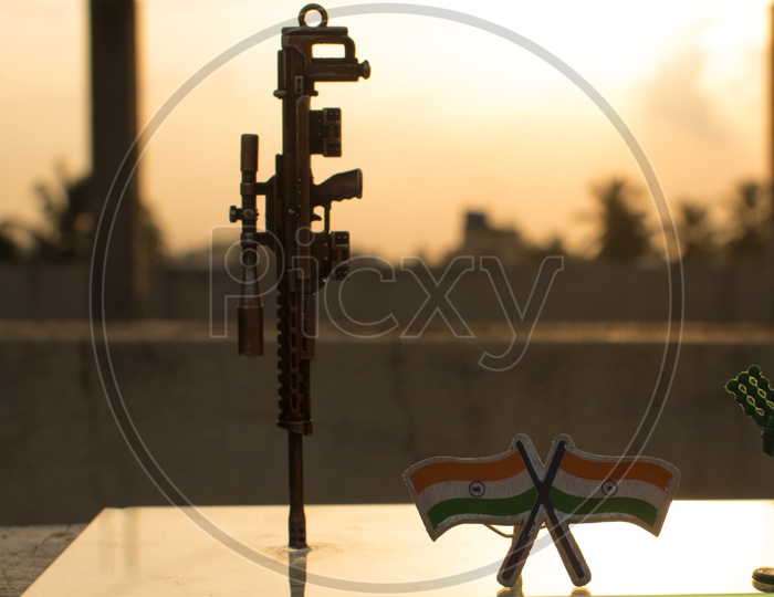 Indian Soldier Representation With Gun And Indian Flag Miniature