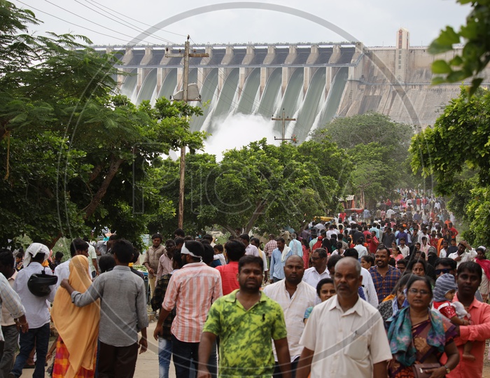 Visitors Crowd At Nagarjuna Sagar Dam Gates Opened Water Gushing Heavily