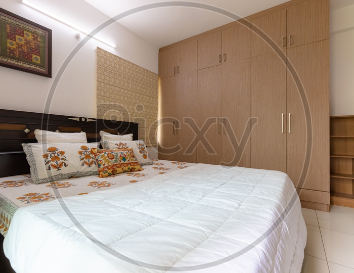 Bright Cozy Modern  Bedroom  With Interior And King Size Bed Wardrobes