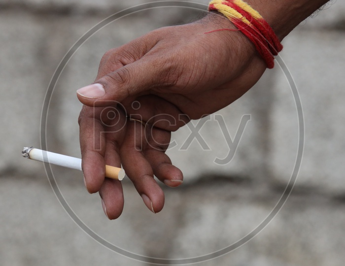 Indian Man Smoking Cigarette  Hand Closeup
