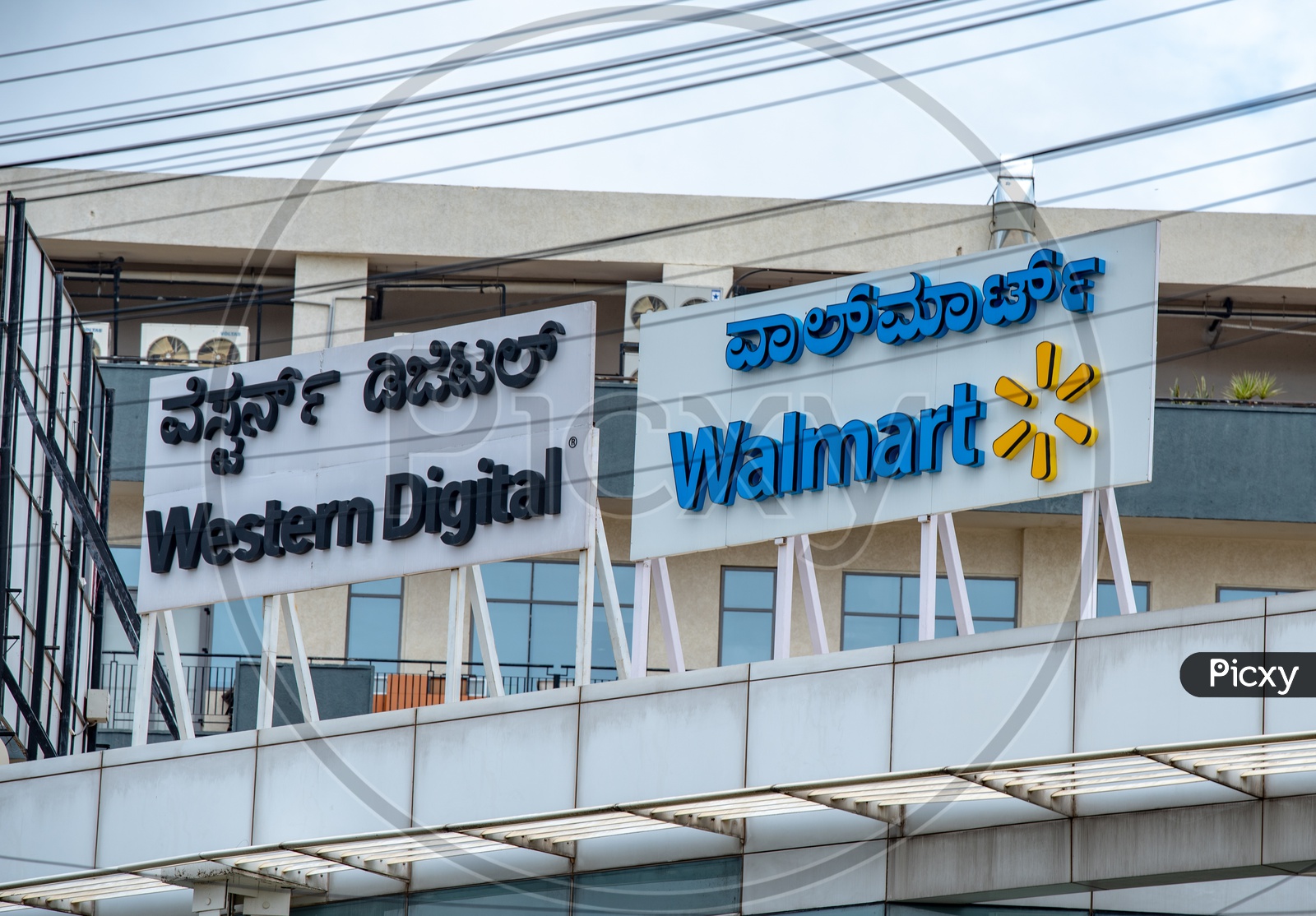 Western digital and Walmart name boards on corporate office