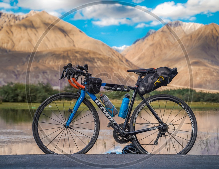 Bicycle Cycle Bike  B-Twin  On  The Roads Of Leh With a View Of Mountains in Background