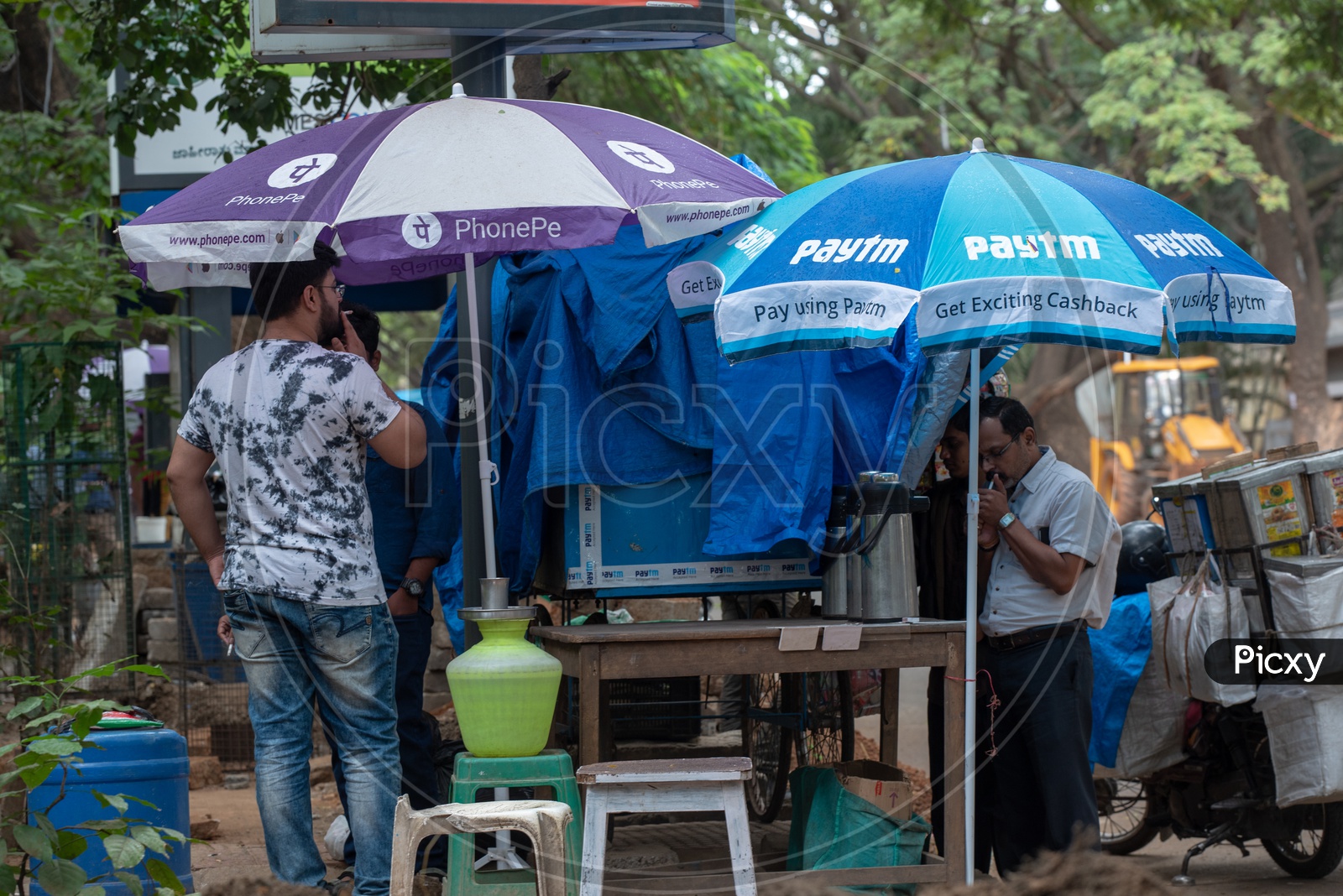 Phonepe paytm promotional umbrellas at pit shops in Bangalore city