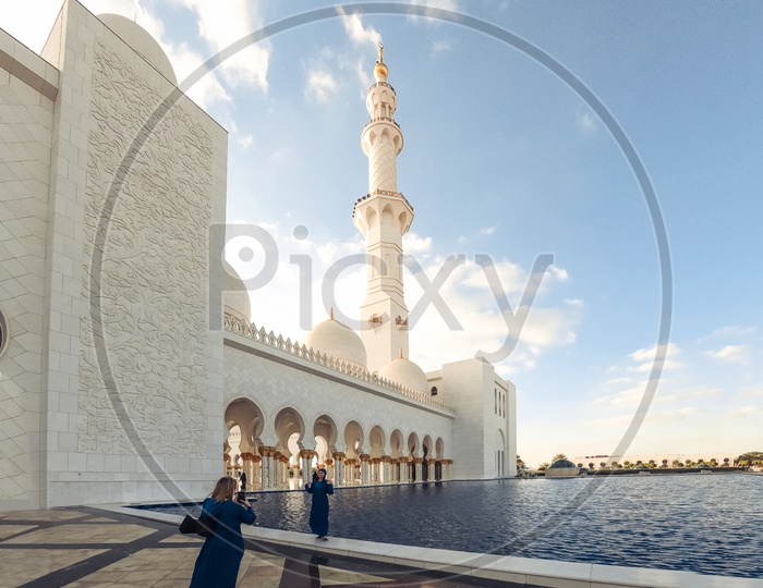 Woman Taking Pictures At  Sheik Zayed Grand Mosque Center