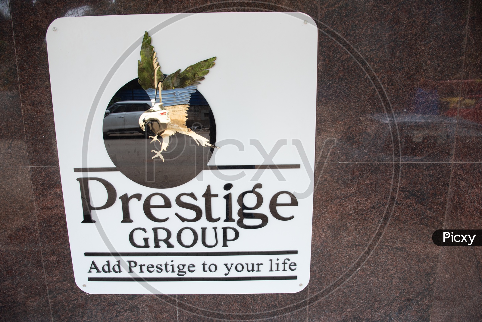 Prestige Group corporate company logo closeup