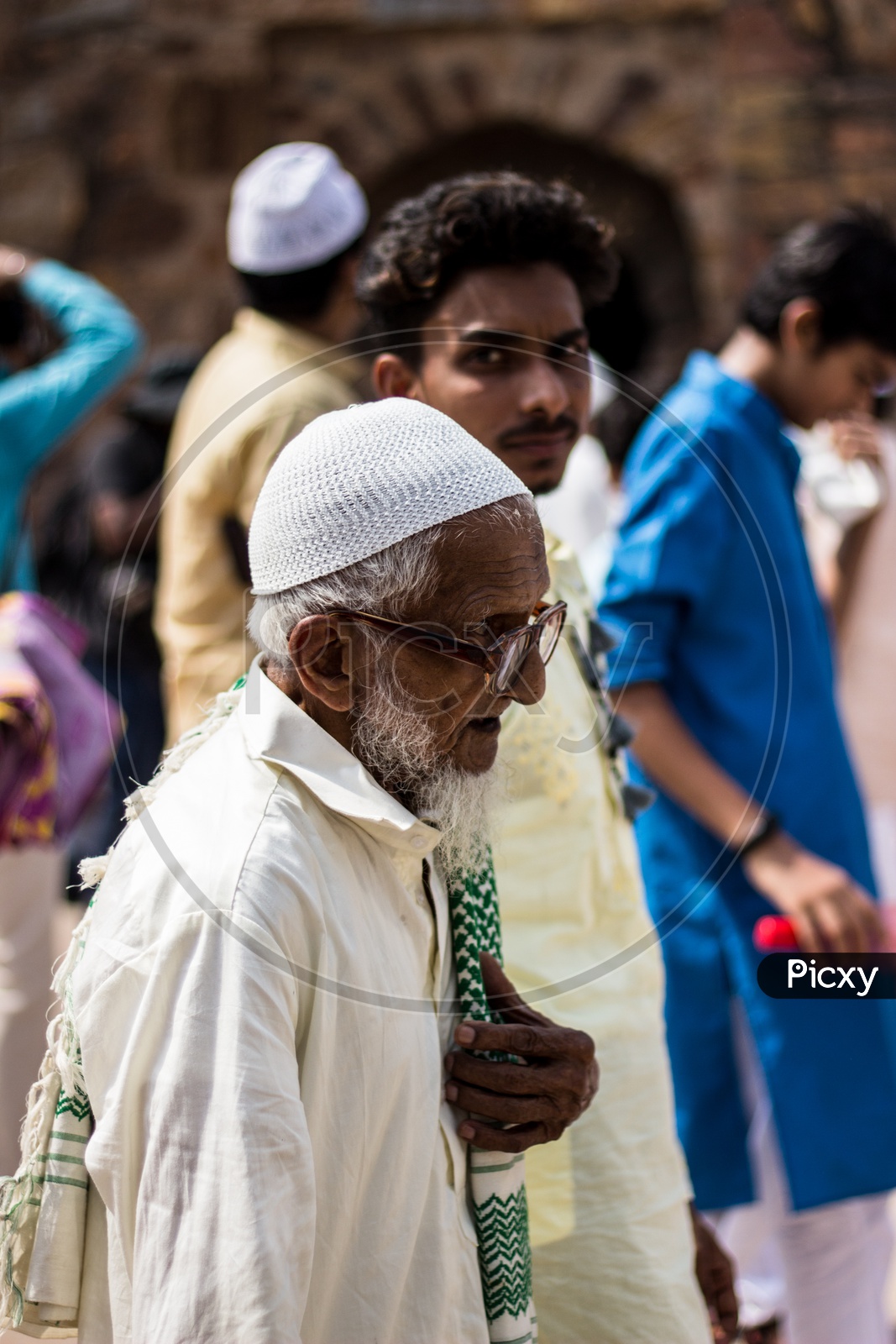 An old man at mosque during namaz or prayers at a mosque in Delhi