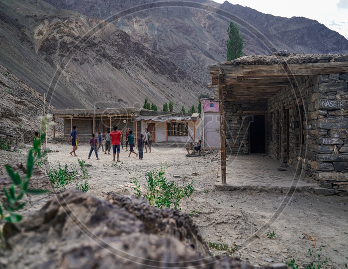 Children Playing Volleyball In the Rural Village school of Leh