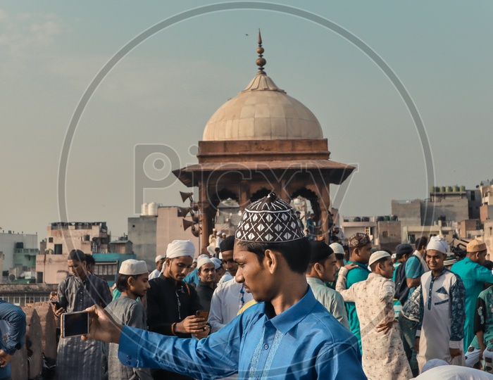 A Muslim Devotee Taking Selfie At Jama Masjid During Ramdan Ramzan  Eid-ul-fitr Prayers