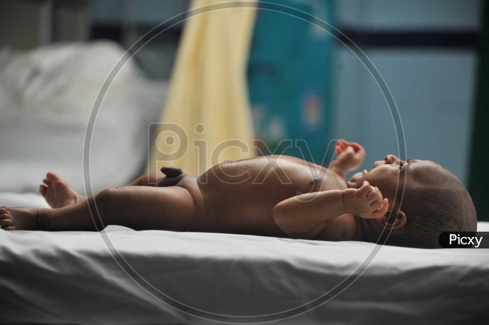 New Born Baby Boy On a Hospital Bed