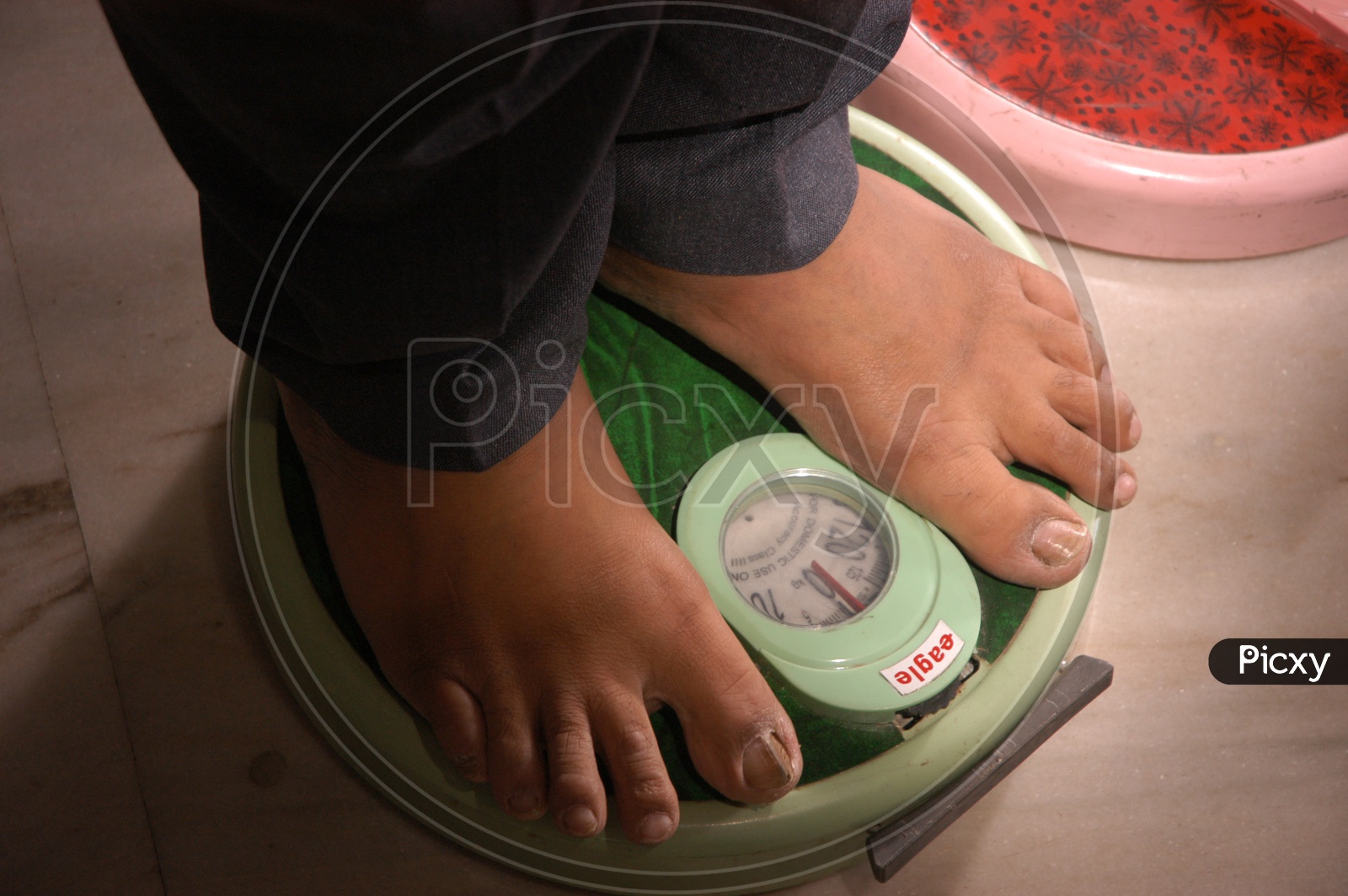 Man checking weight