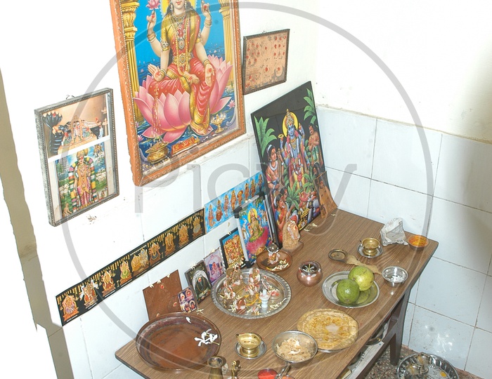 Hindu God Photo Frames in a House Pooja Room