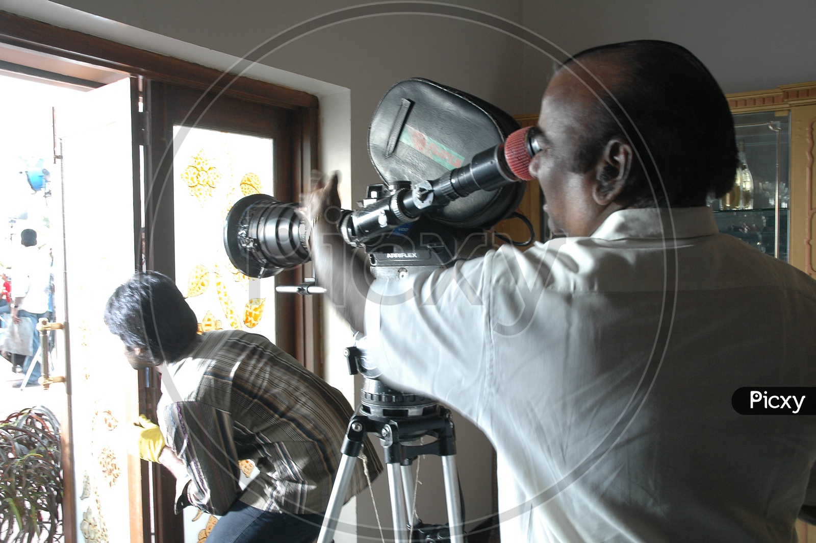 Cinematographer with Movie Camera