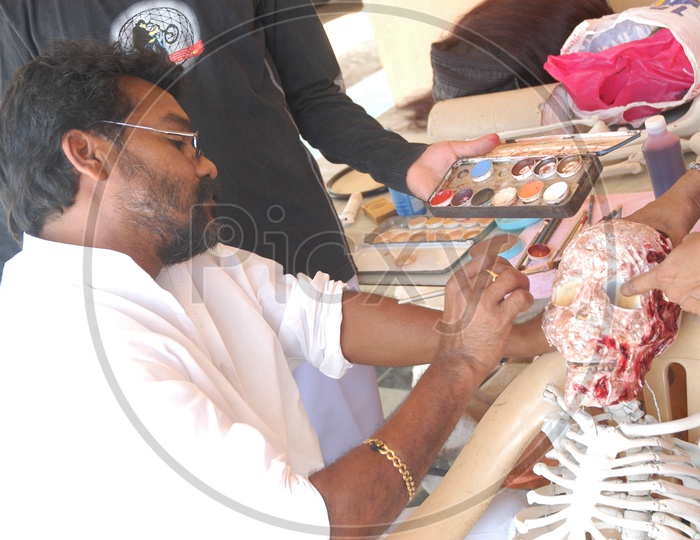 Artist preparing a dummy Skeleton