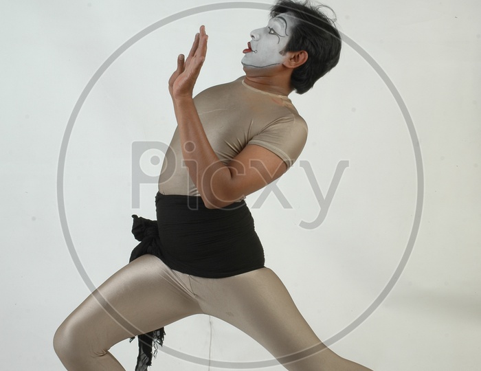 Male Mime Artist With Gestures Isolated over White Background