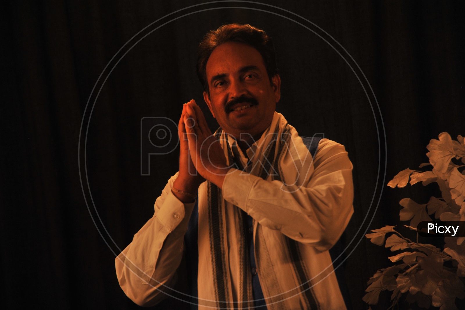 Indian Man As Politician Posing For a Photo In a Studio Setup