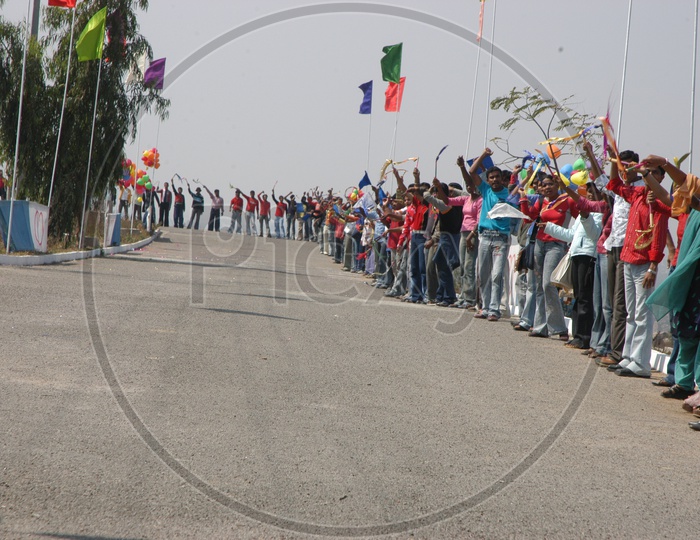 People cheering for Road Bicycle racers