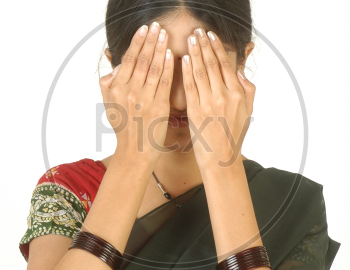 Young Woman closed eyes with hands