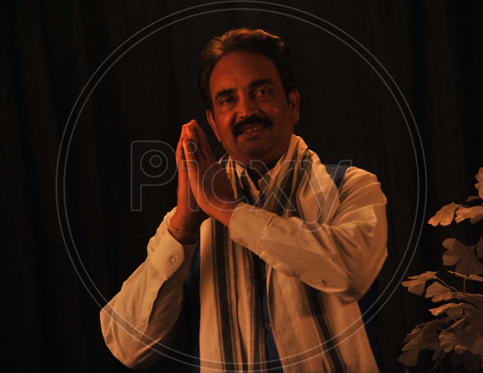 Indian Man As Politician Posing For a Photo In a Studio Setup