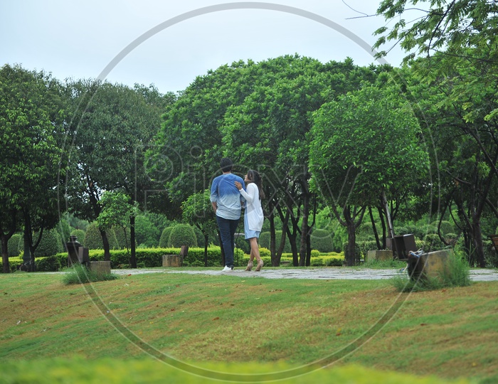 Young Indian Couple walking in a Park