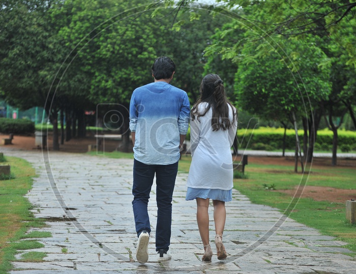 Young Indian Couple walking in a Park
