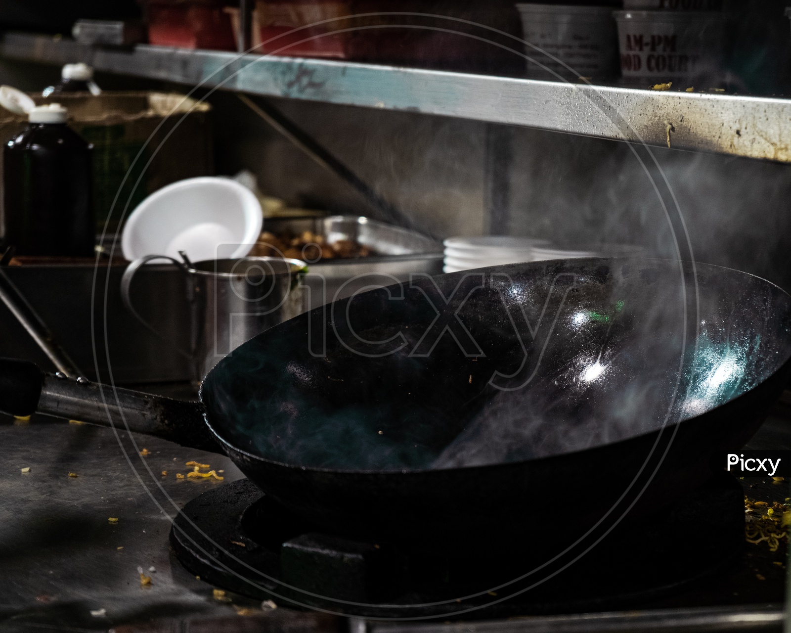 Empty wok with smoke