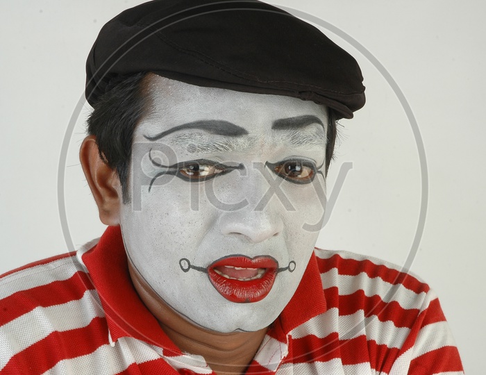 Male Mime Artist With Expressions Isolated over White Background
