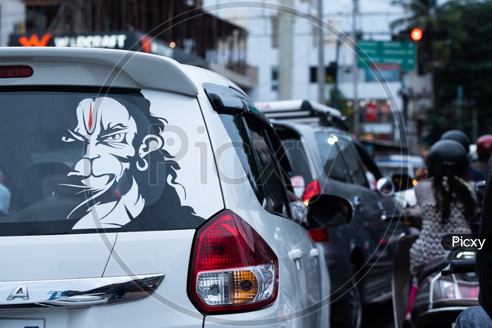 Angry Hanuman Poster on the back of a Car