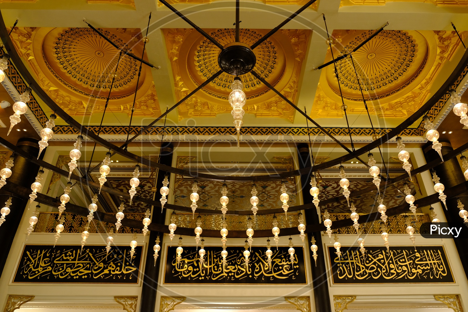 Ceiling and hanging lights at Katara Masjid
