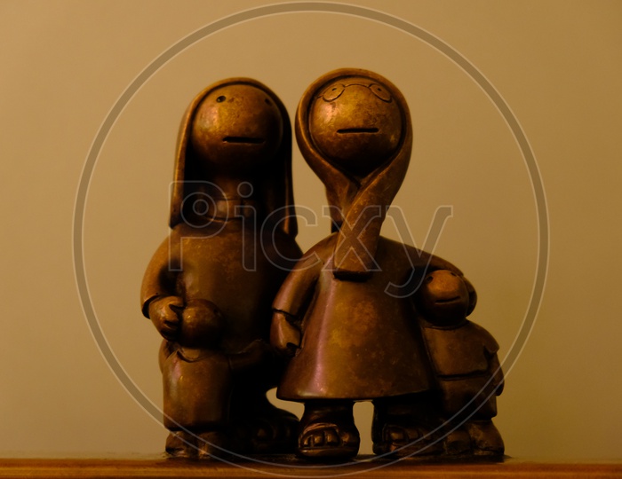 Brass Toys Or Miniatures  of a Family