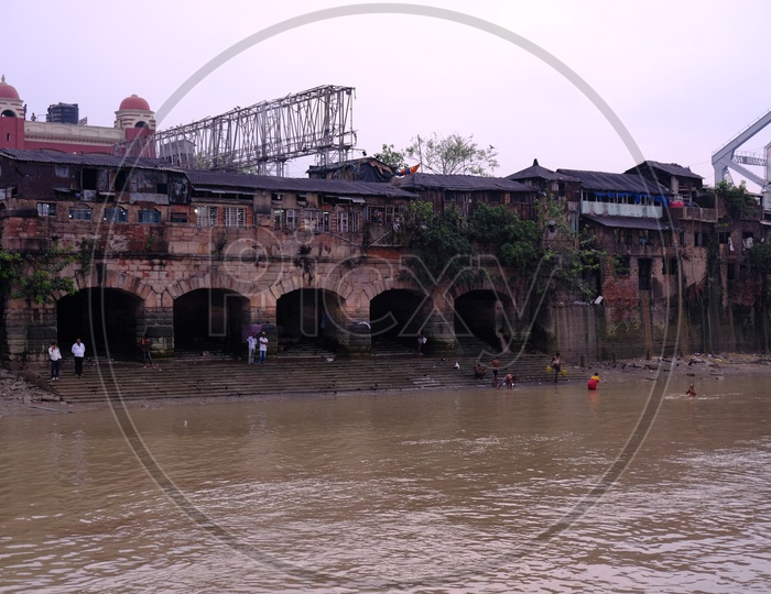 People Taking Dip in Hooghly River