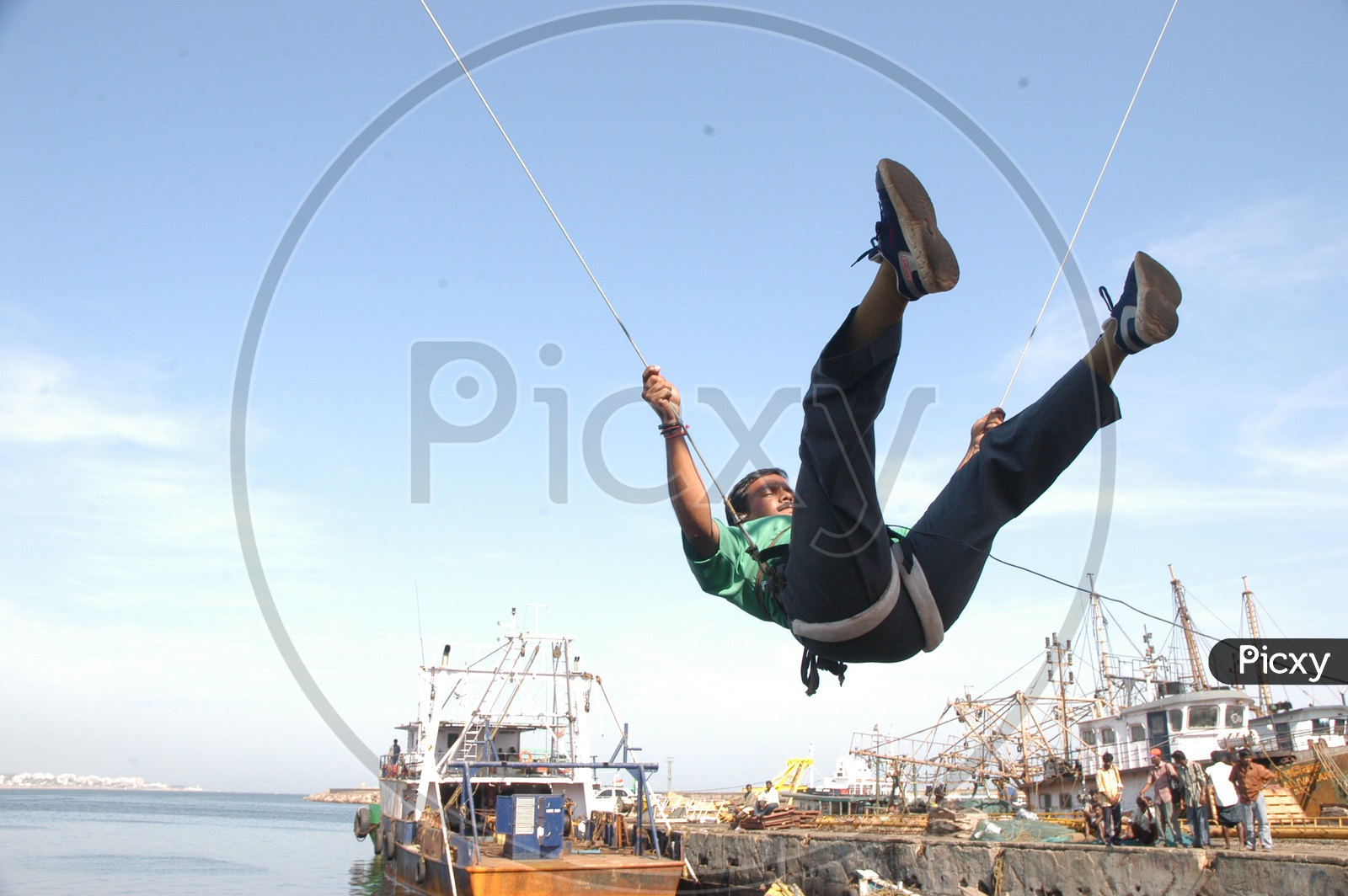Stunt Man With Ropes In a Movie Shooting